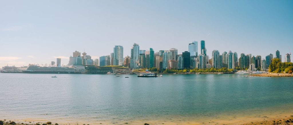 Explore the stunning Vancouver skyline with a picturesque waterfront. Perfect for travel and cityscape enthusiasts.